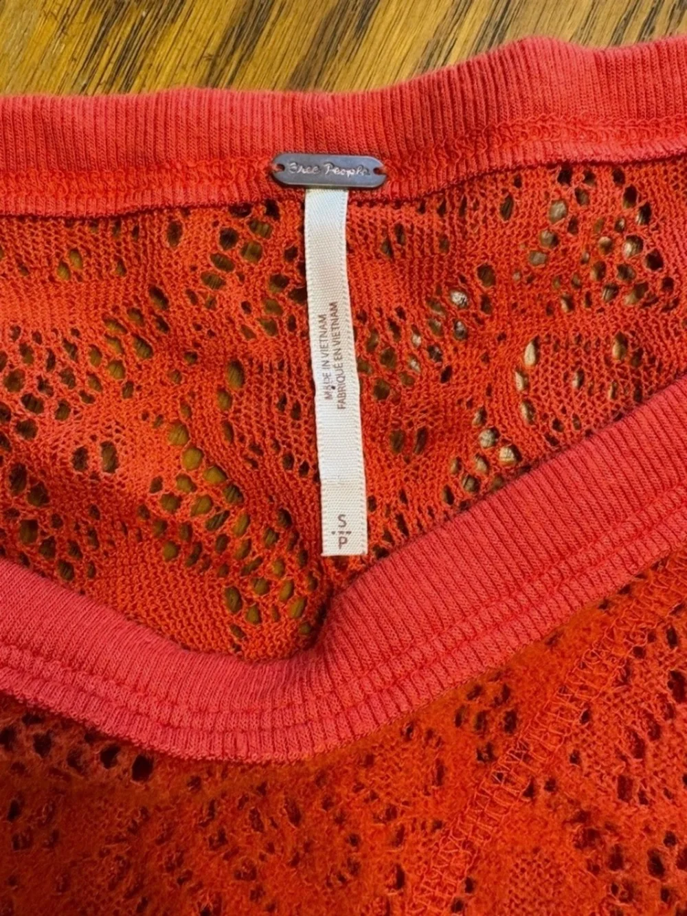 FREE PEOPLE Not Cold In This Lace Top size Small orange oversize lacy sweatshirt